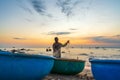 View of the beach at the basket boat dock at sunset Royalty Free Stock Photo