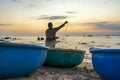 View of the beach at the basket boat dock at sunset Royalty Free Stock Photo