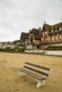 Bench on the sand of Trouville beach Royalty Free Stock Photo