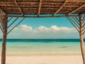 View from a beach cabana on the Caribbean, blue ocean and cloudy sky. A perfect summers day. Tropical background Royalty Free Stock Photo