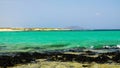 View on the beach Corralejo and island Lobos.