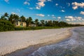 View of the beach from the fishing pier in Naples, Florida. Royalty Free Stock Photo