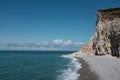 a view from a beach looking out at the ocean with white cliffs Royalty Free Stock Photo