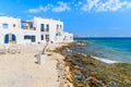 A view of beach in Naoussa port with traditional white Greek architecture, Paros island, Cyclades, Greece Royalty Free Stock Photo