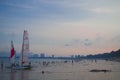 View of the beach with people against the background of the sky at sunset. Zhangzhou, China.