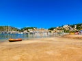 View of the beach of Port de Soller with people lying on sand, Soller, Balearic islands, Spain. Royalty Free Stock Photo