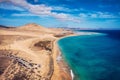 View on the beach Sotavento with golden sand and crystal sea water of amazing colors on Costa Calma on the Canary Island