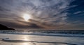 View of Beach at Sunset with Clouds Rolling In