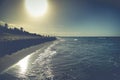 View on beach at sunset with kids play football Royalty Free Stock Photo