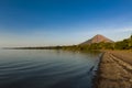 View of a beach at sunset in the Ometepe Island, with the Concepcion Volcano on the background in Nicaragua