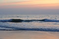 View from a beach on a sunset over the ocean. Coast of India, Indian Ocean Royalty Free Stock Photo