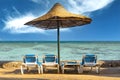 View of the beach with umbrellas and sun beds, the red sea, Hurgada, Egypt Royalty Free Stock Photo