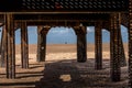 View of beach from under the Pier Royalty Free Stock Photo