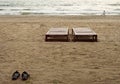 View on seacoast beach with two chears two shoose