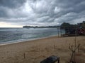 view of the beach wide waters and overcast clouds