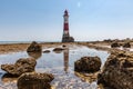 A view of Beachy Head Lighthouse off the Sussex coast, at low tide on a summer\'s day Royalty Free Stock Photo