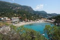 View of a beautiful Agios Spyridon bay and beach in Palaiokastritsa with crystal turquoise sea water, Corfu Royalty Free Stock Photo