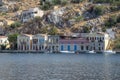 View of beautiful bay with colorful houses on the hillside of the island of Symi. Greece