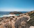 View of the beautiful beach in Balos Lagoon, and Gramvousa island on Crete, Greece. Sunny day, blue Sky with clouds. Royalty Free Stock Photo