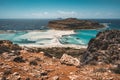 View of the beautiful beach in Balos Lagoon, and Gramvousa island on Crete, Greece. Sunny day, blue Sky with clouds. Royalty Free Stock Photo