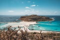 View of the beautiful beach in Balos Lagoon, and Gramvousa island on Crete, Greece. Sunny day, blue Sky with clouds. Royalty Free Stock Photo