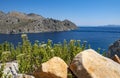 A Breathtaking View of the Moutains and Blue Aegean Sea Along the Shore of Symi, Greece Royalty Free Stock Photo