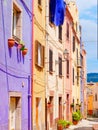 View of the beautiful, colorful, narrow street in Bosa. province of Oristano, Sardinia,