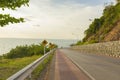 Beautiful curve road by the sea and mountain at Noen-nangphaya view point in Chanthaburi, Thailand. Royalty Free Stock Photo