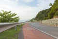 Beautiful curve road by the sea and mountain at Noen-nangphaya view point in Chanthaburi, Thailand. Royalty Free Stock Photo