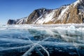 View of beautiful drawings on ice from cracks and bubbles of deep gas on surface of Baikal lake in winter, Russia Royalty Free Stock Photo