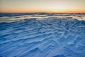 View of beautiful drawings on ice from cracks and bubbles of deep gas on surface of Baikal lake in winter, Russia Royalty Free Stock Photo