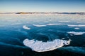 View of beautiful drawings on ice from cracks and bubbles of deep gas on surface of Baikal lake in winter, Russia Royalty Free Stock Photo