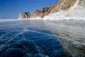 View of beautiful drawings on ice from cracks and bubbles of deep gas on surface of Baikal lake in winter, Russia Royalty Free Stock Photo