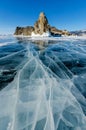 View of beautiful drawings on ice from cracks and bubbles of deep gas on surface of Baikal lake in winter, Russia Royalty Free Stock Photo