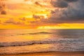 View of Beautiful glorious golden sunset and golden hour above the sea in evening