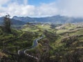 View of Beautiful Gran Canaria inland central mountains and green hills with winding asphalt road. Canary island, Spain Royalty Free Stock Photo