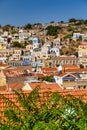 View of the beautiful greek island of Symi (Simi) with colourful houses and small boats. Greece, Symi island