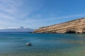 View of beautiful Matala beach with cliffs on the Crete island. Summer background