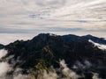 View of beautiful mountain landscape above the clouds of Madeira Island - Green mountain landscape with view above the Royalty Free Stock Photo