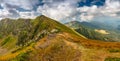 View of beautiful mountains panoramic landscape of a rocky cliffs and green hills. Royalty Free Stock Photo