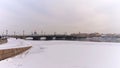 St. Petersburg, Russia, February 10, 2024. Lieutenant Schmidt Bridge in the city center in winter. Royalty Free Stock Photo