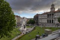 View of the beautiful Praca do Infante D. Henrique with people relaxing in the lawn, in the city of Porto