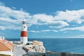 A view of beautiful red and white Trinity Lighthouse, orange til