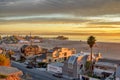 View of Santa Monica beach in California, coastal homes and pier at sunset. Royalty Free Stock Photo