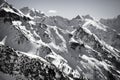 View on beautiful snowcapped rocky mountain range in pyrenees in black and white, france