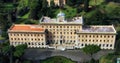 View on beautiful stone yellow Palace of the Governorate of Vatican City State in style baroque in Rome in Italy Royalty Free Stock Photo