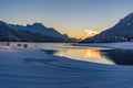 View of beautiful sunet at Lake Silvaplana, Switzerland, in cold winter evening