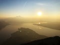 A view of the beautiful sunset over the lakes Lucerne VierwaldstÃÂ¤ttersee and KÃÂ¼ssnachtersee lake from the Rigi Mountain Royalty Free Stock Photo