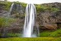 View of beautiful waterfall Seljalandsfoss in summer, Iceland Royalty Free Stock Photo