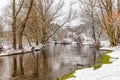 Winter landscape in the snowy forest and Warta river in Mstow, Poland Royalty Free Stock Photo